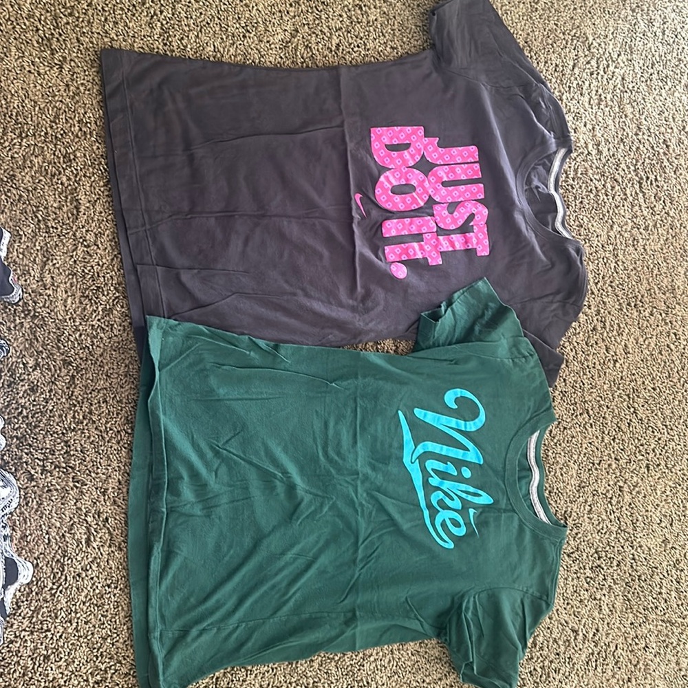 2 Nike tee shirts. Worn but in excellent condition